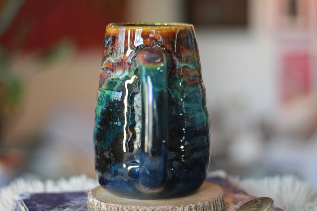 09-F Surprise New Earth Textured Mug, 22 oz.