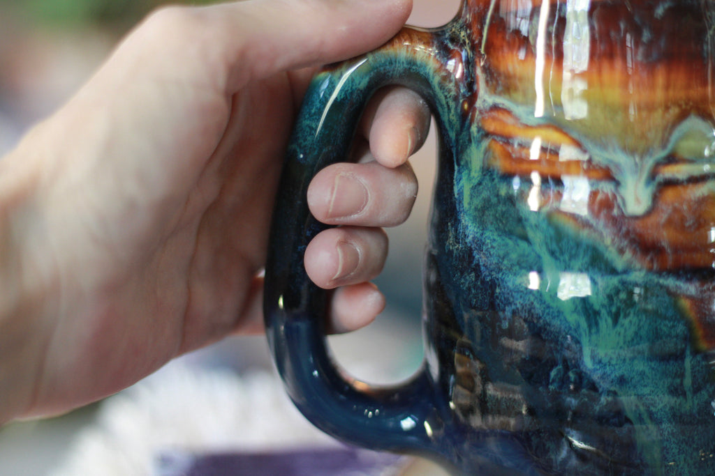 09-F Surprise New Earth Textured Mug, 22 oz.
