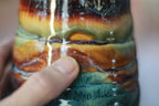 09-F Surprise New Earth Textured Mug, 22 oz.