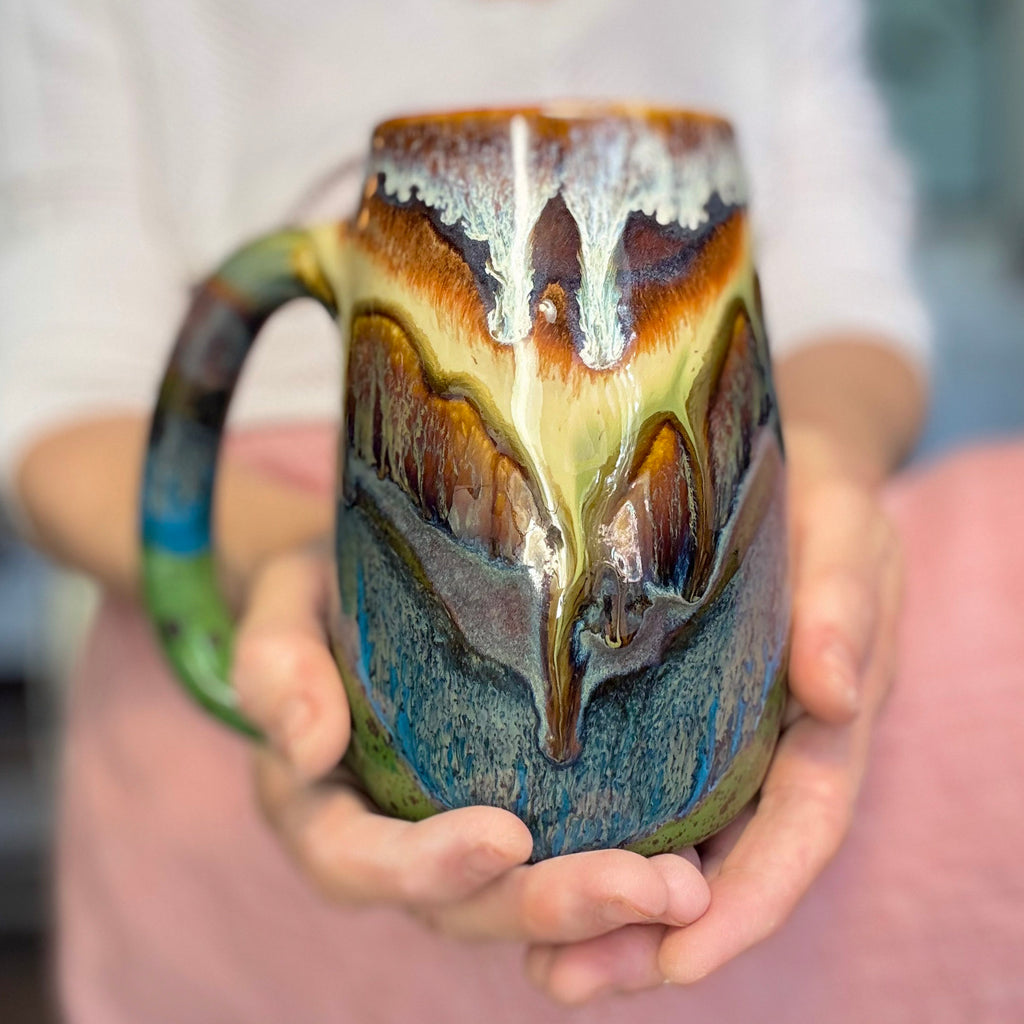 02-A New Earth Mug, 25 oz.