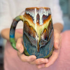 02-A New Earth Mug, 25 oz.