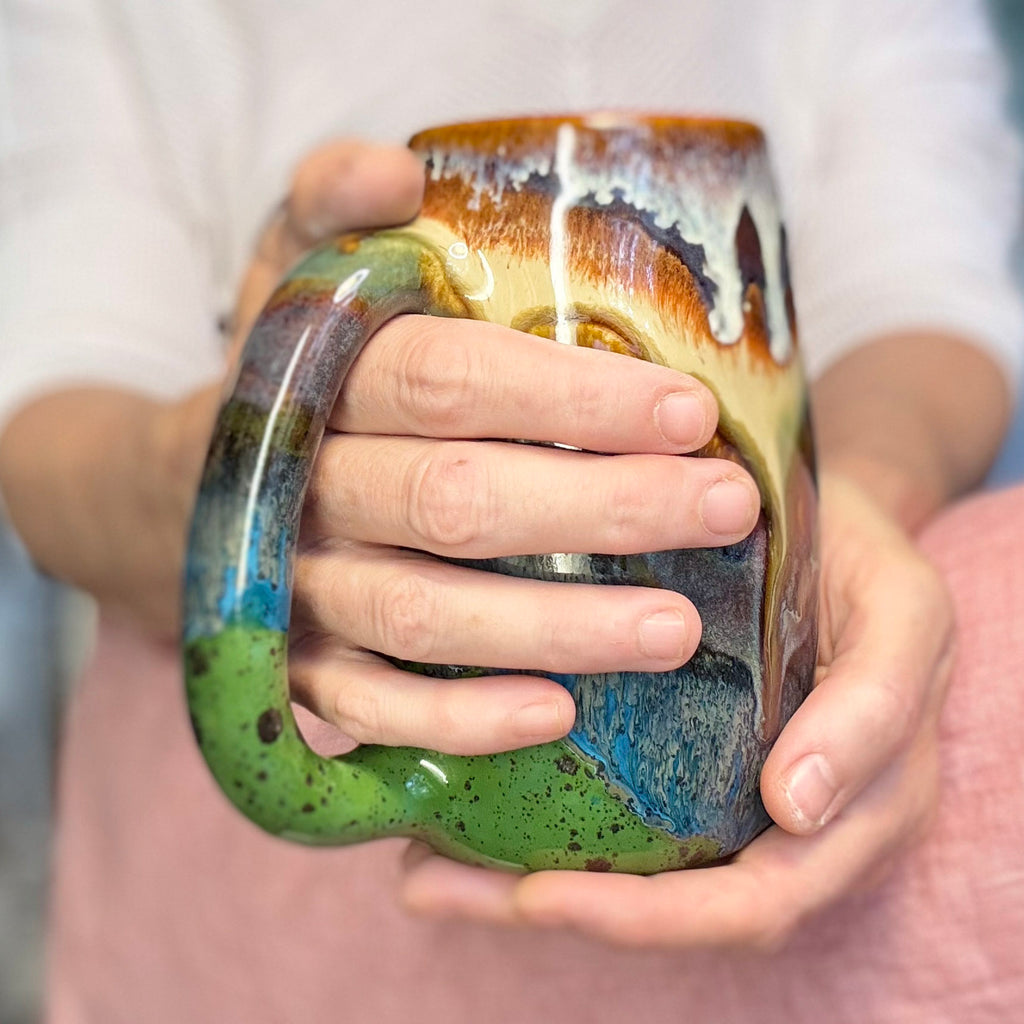 02-A New Earth Mug, 25 oz.