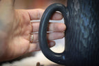 19-E Black Textured Mug, 23 oz.