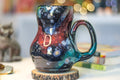 27-A Rainbow Stellar Acorn Gourd Mug, 25 oz.