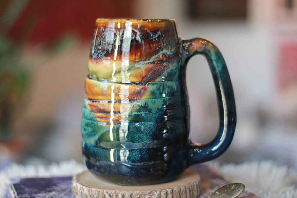 09-F Surprise New Earth Textured Mug, 22 oz.