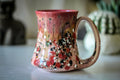 11-E EXPERIMENT Flared Mug, 12 oz.