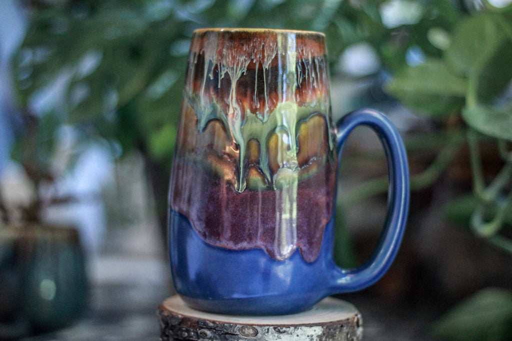 11-A New Earth Mug, 25 oz.