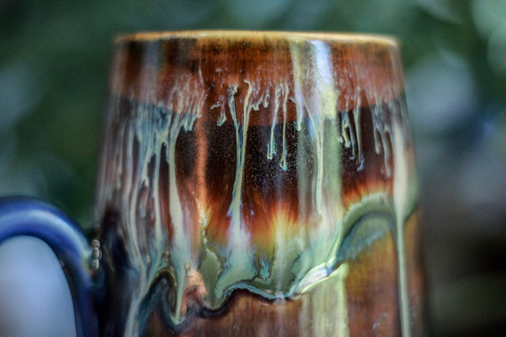 11-A New Earth Mug, 25 oz.