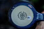 11-A New Earth Mug, 25 oz.