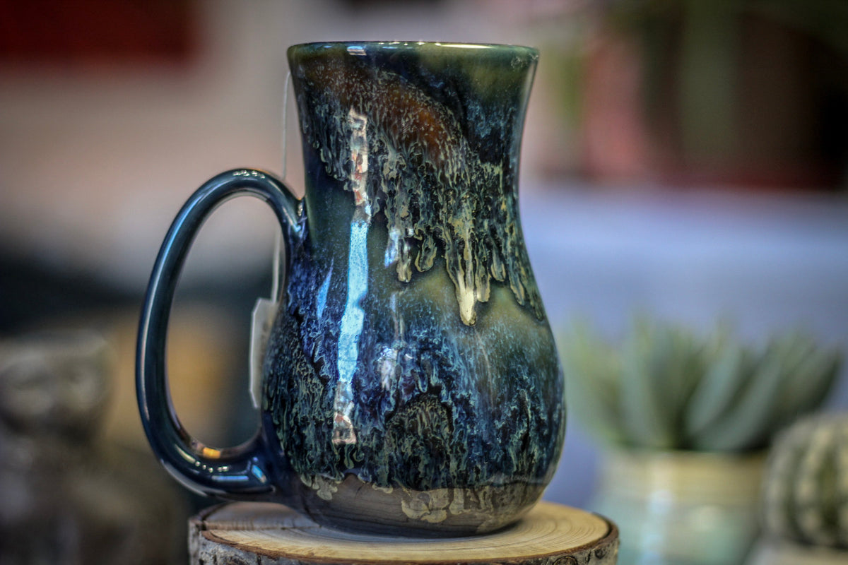 12-D Moody Blues Barely Flared Notched Mug, 16 oz.