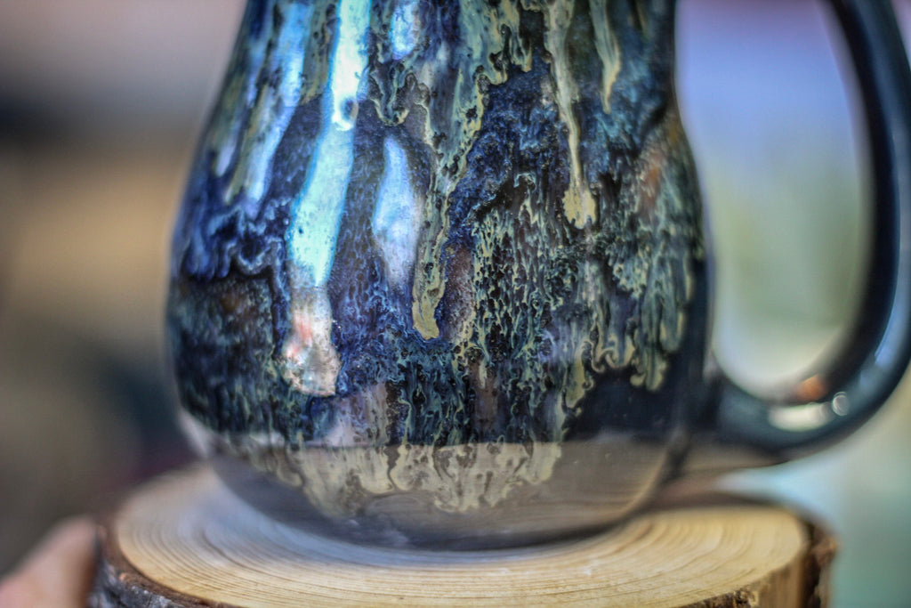 12-D Moody Blues Barely Flared Notched Mug, 16 oz.