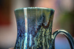12-D Moody Blues Barely Flared Notched Mug, 16 oz.