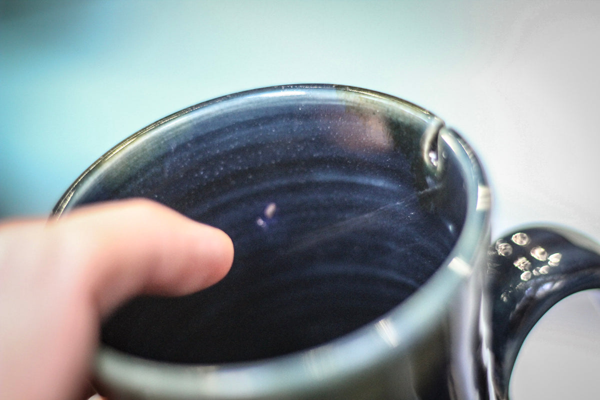 12-D Moody Blues Barely Flared Notched Mug, 16 oz.