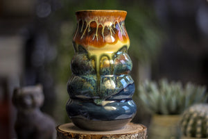 16-A New Earth Vase, 21 oz.
