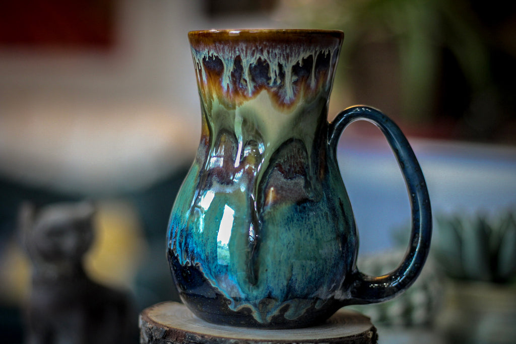 17-A New Earth Flared Mug, 16 oz.