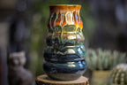 16-A New Earth Vase, 21 oz.