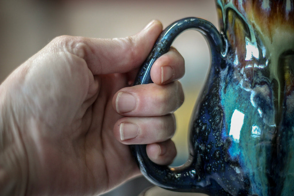 17-A New Earth Flared Mug, 16 oz.