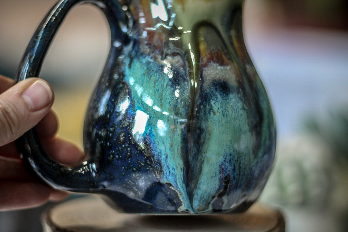 17-A New Earth Flared Mug, 16 oz.