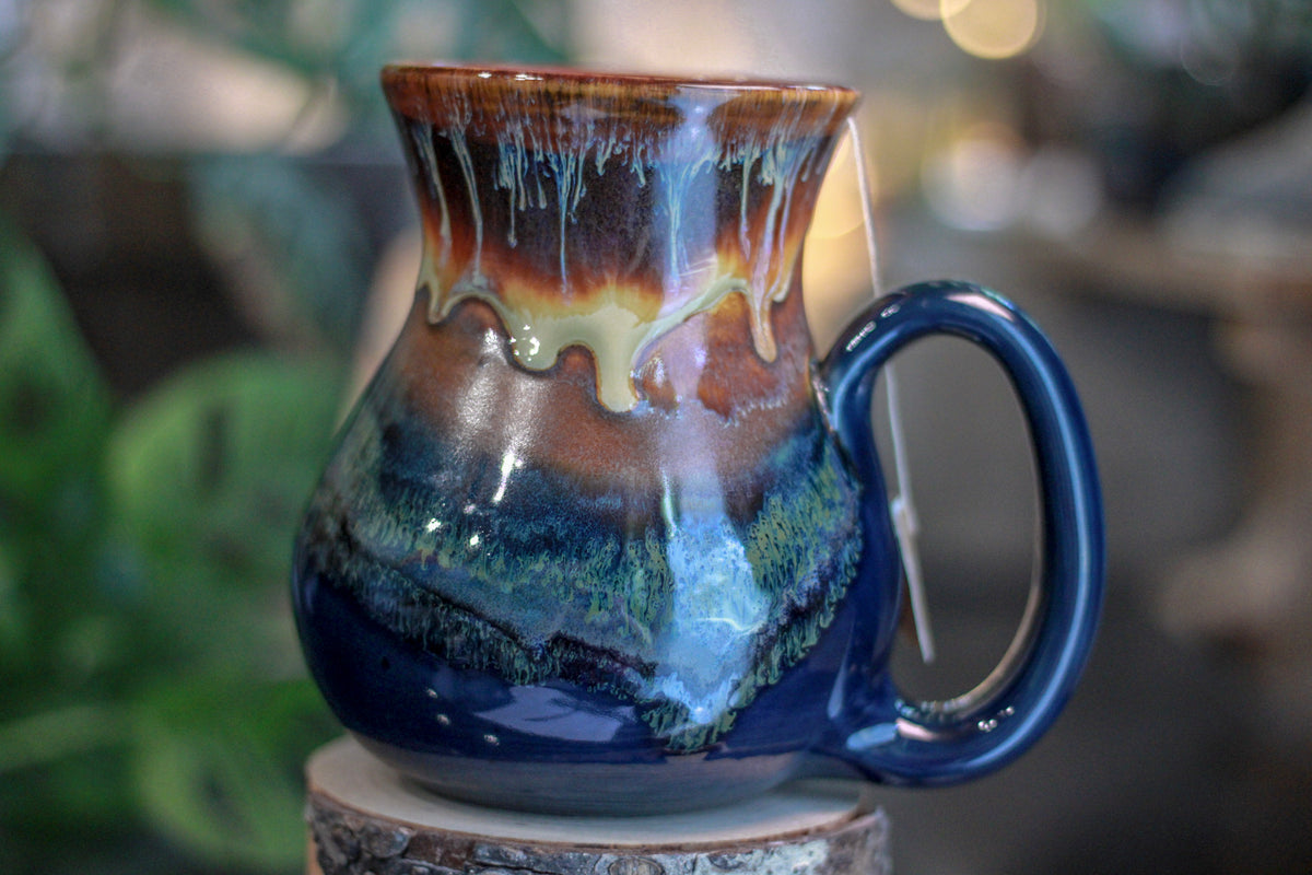 17-A New Earth Flared Notched Mug, 26 oz.