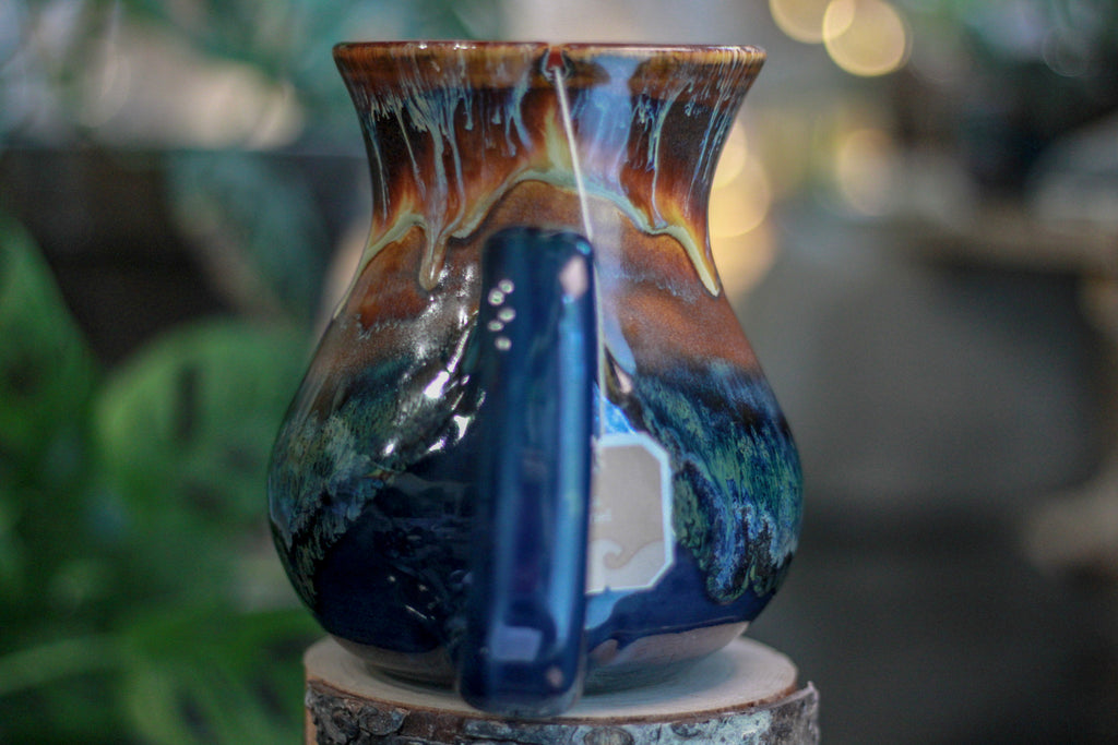 17-A New Earth Flared Notched Mug, 26 oz.