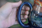 17-A New Earth Flared Notched Mug, 26 oz.