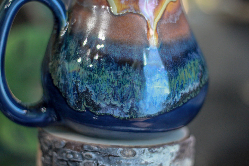 17-A New Earth Flared Notched Mug, 26 oz.