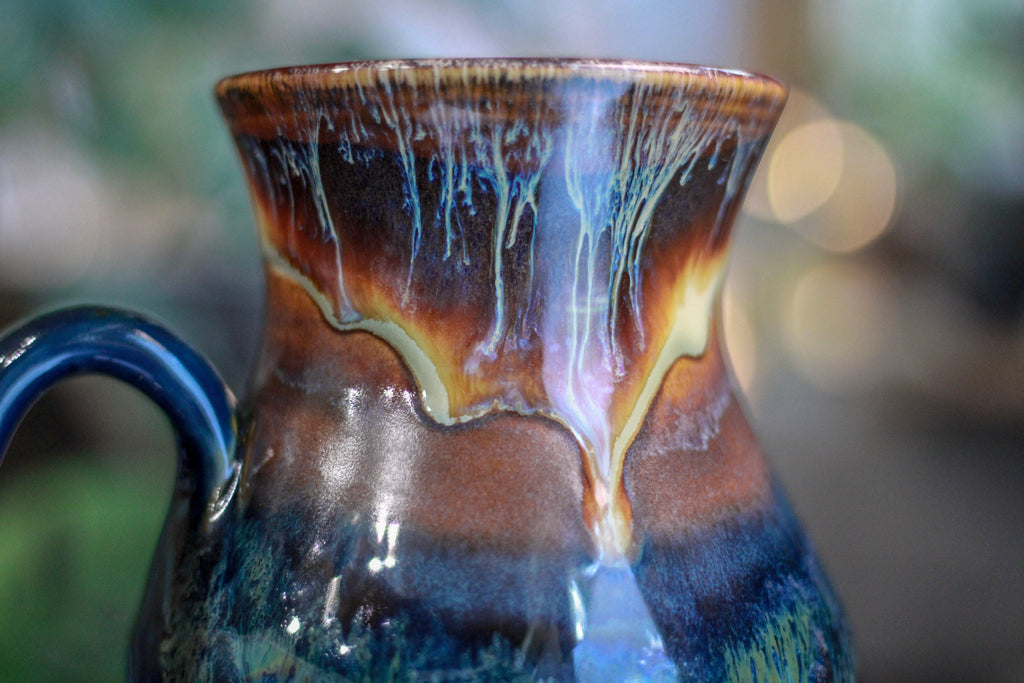 17-A New Earth Flared Notched Mug, 26 oz.