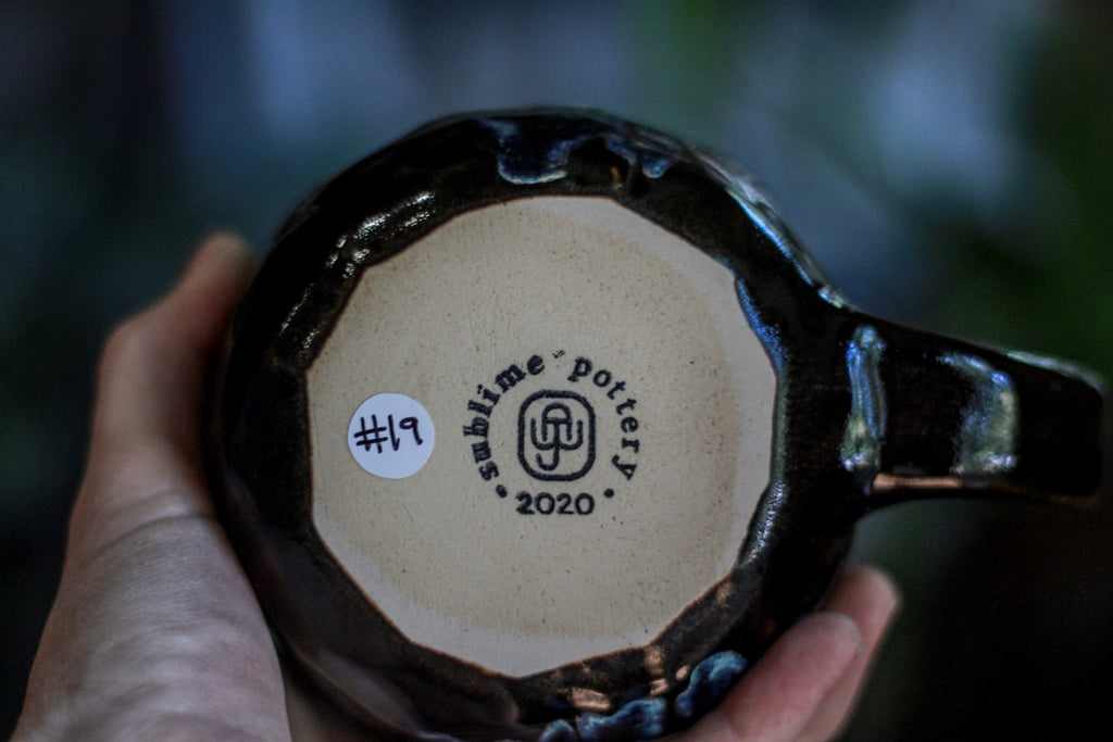 19-A New Earth Notched Crystal Mug, 27 oz.