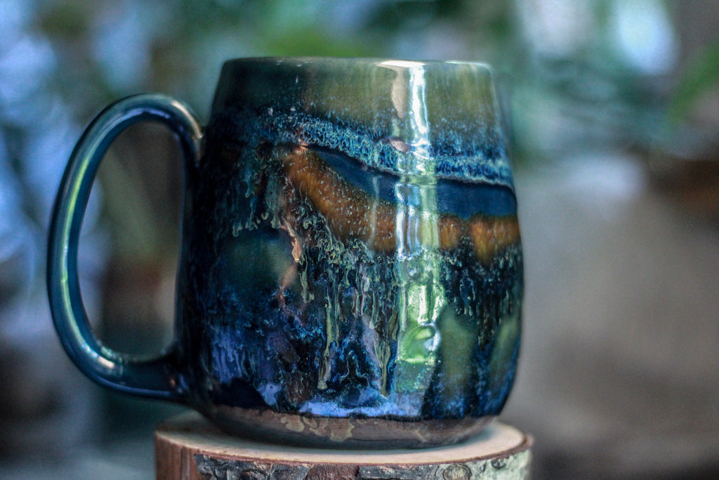 21-D Moody Blues Squat Mug, 25 oz.