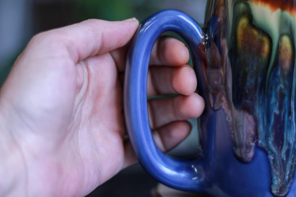 21-A New Earth Mug - TOP SHELF, 25 oz.