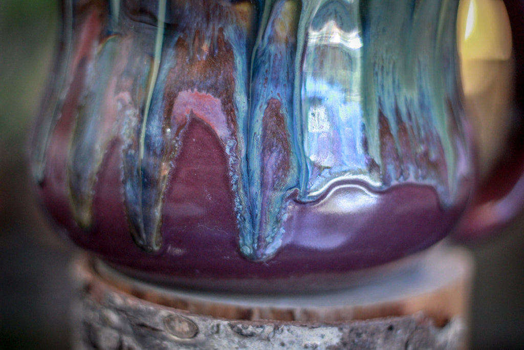 25-C New Earth Notched Pitcher, 33 oz.