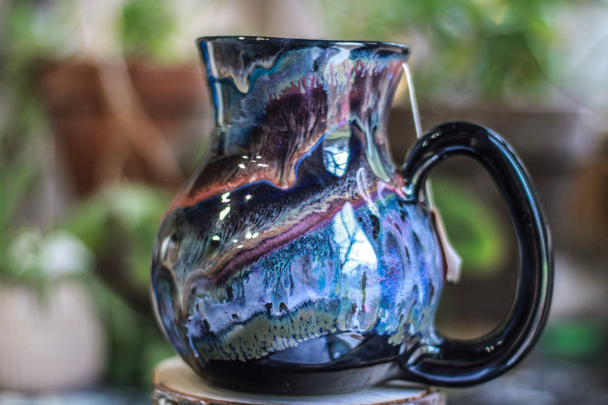 24-B Black Rainbow Grotto Flared Notched Mug, 22 oz.