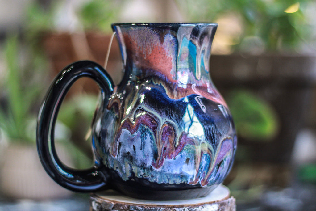24-B Black Rainbow Grotto Flared Notched Mug, 22 oz.