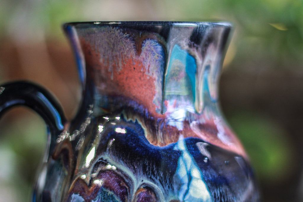 24-B Black Rainbow Grotto Flared Notched Mug, 22 oz.