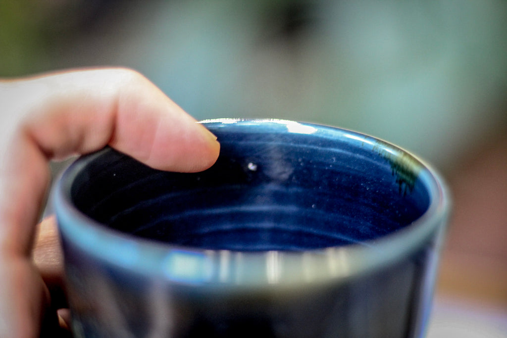 09-E Moody Blues Barely Flared Mug, 15 oz.
