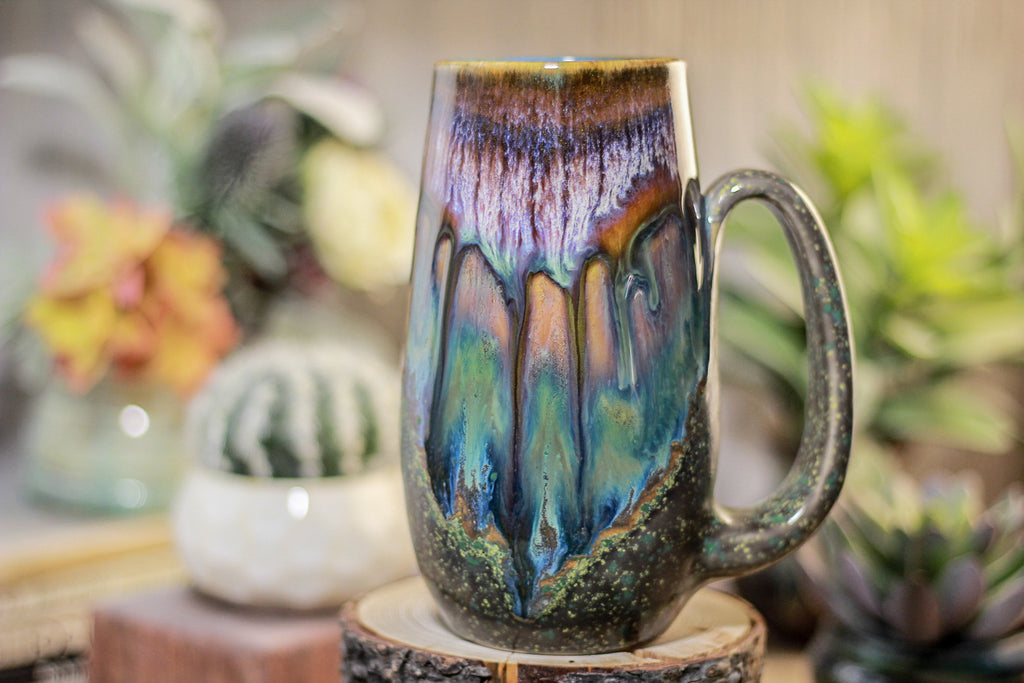 12-A New Earth Mug, 21 oz.