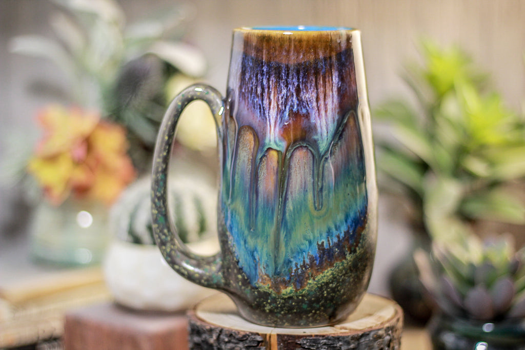 12-A New Earth Mug, 21 oz.