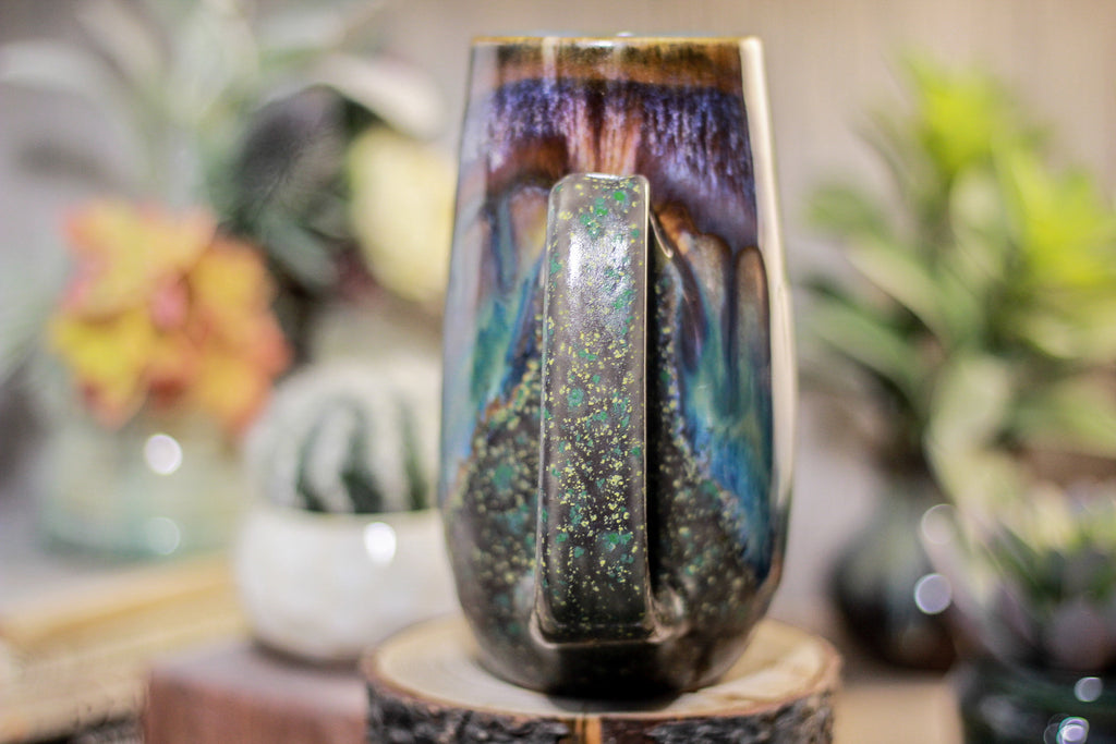 12-A New Earth Mug, 21 oz.