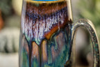12-A New Earth Mug, 21 oz.
