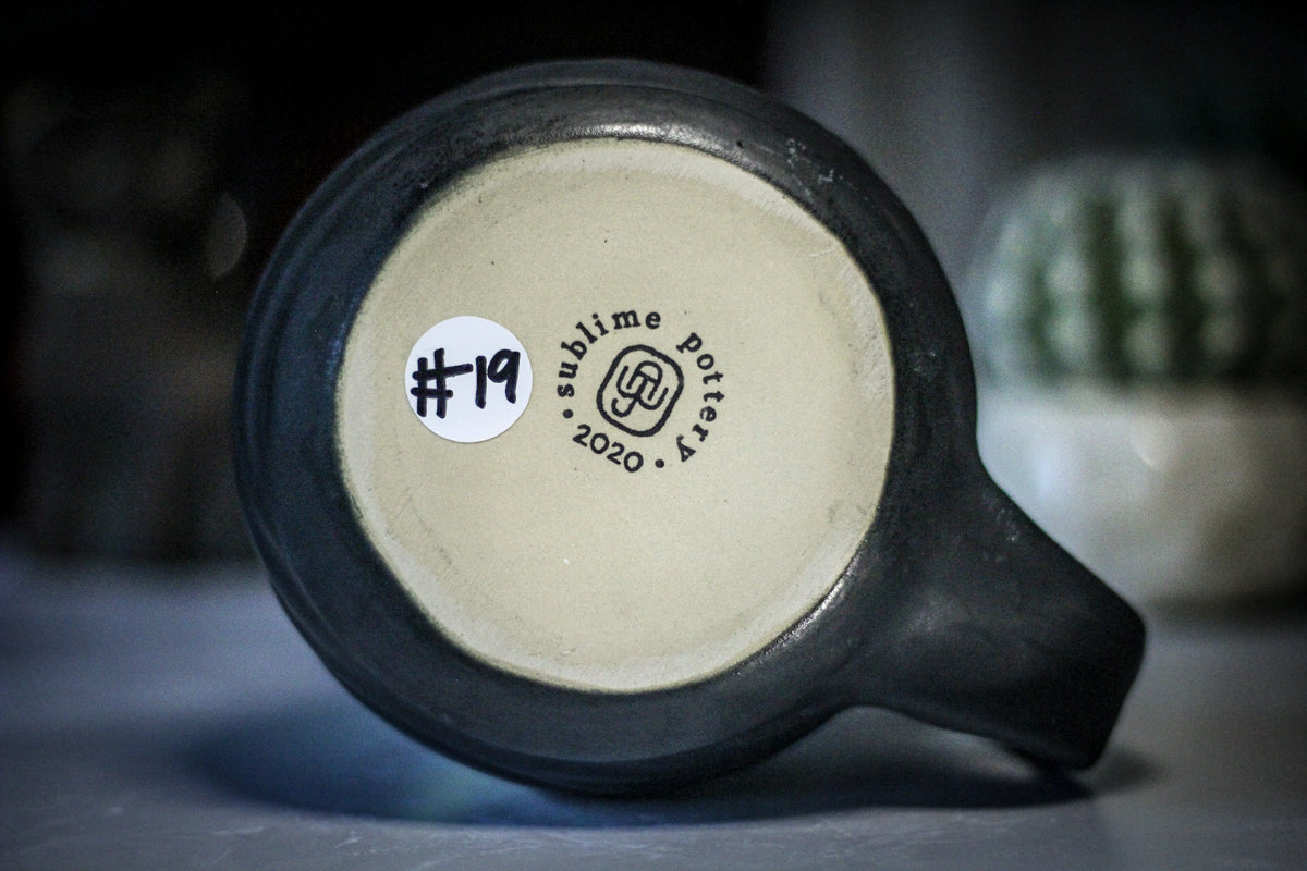19-E PROTOTYPE Flared Textured Mug, 21 oz.